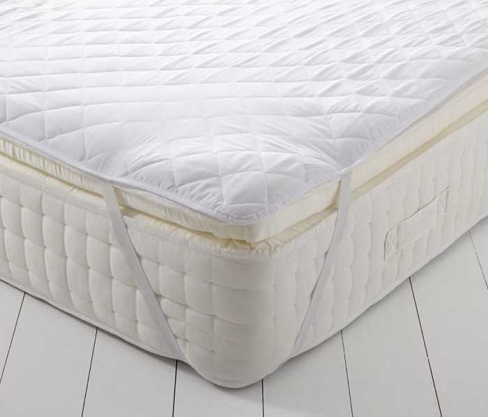 Sử dụng Topper nệm, tấm bảo vệ là cách làm cứng nệm Foam hiệu quả